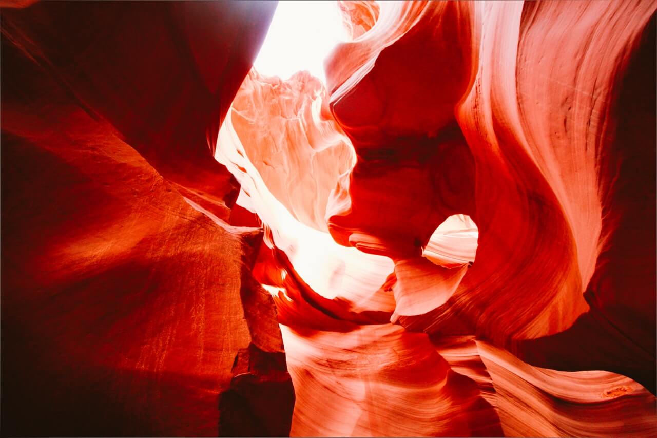 Red light reflected off the surface of rocks in Arizona's Antelope Canyon